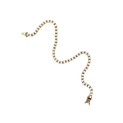 14ct Yellow Gold Diamond Line Bracelet. Set with 3.35ct of diamonds. Weighing 12.24g. Excellent condition.
