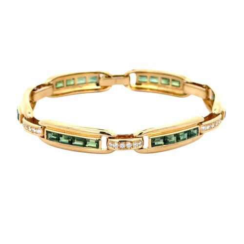 72 - Green Tourmaline & Diamond Bracelet. A lovely 18ct yellow gold green tourmaline and diamond brac... 