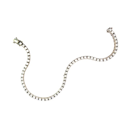 78 - 18ct White Gold Diamond Line Bracelet. 3.54ct Diamonds. Weighing 14.59g. Excellent Condition.