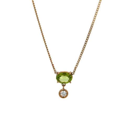 121 - Peridot & Diamond Necklace. A 9ct peridot and diamond drop necklace. Weighing 2.10g. Chain lengt... 