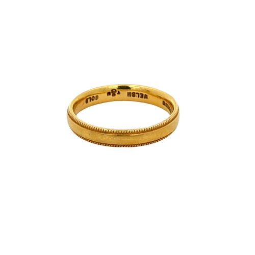 126 - 18ct Welsh Gold Band Ring  An 18ct welsh gold band ring. Weighing 3.15g. Good condition. Hallmarked ... 