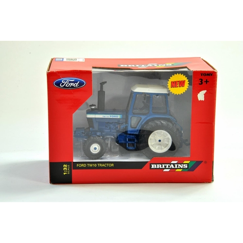 165 - Britains Farm issue comprising 1/32 Ford TW10 Tractor. Appears excellent and secured within box.  Co... 