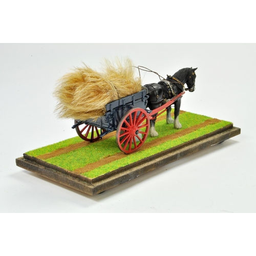 189 - 1/32 Model Farm Issue comprising horse and tumbrel cart combination with hay load. Well presented mo... 