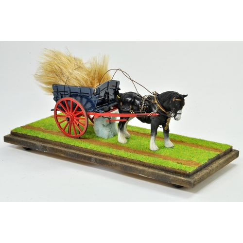 189 - 1/32 Model Farm Issue comprising horse and tumbrel cart combination with hay load. Well presented mo... 