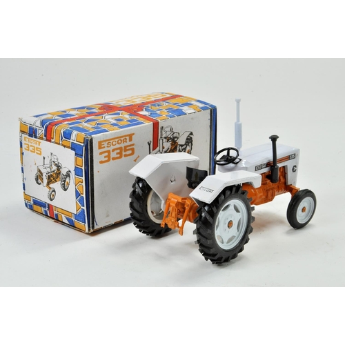 557 - Milton/Maxwell (Indian made) Model Farm issue comprising Escort 335 Tractor . Appears very good to e... 