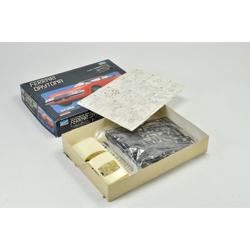 1007 - Crown Motorised Plastic Model Kit comprising 1/24 Ferrari Daytona. Looks to be complete and unstarte... 