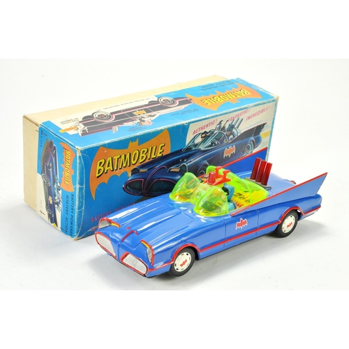 1183 - ASC Japanese large scale tinplate battery operated issue comprising the Batmobile with batman and ro... 