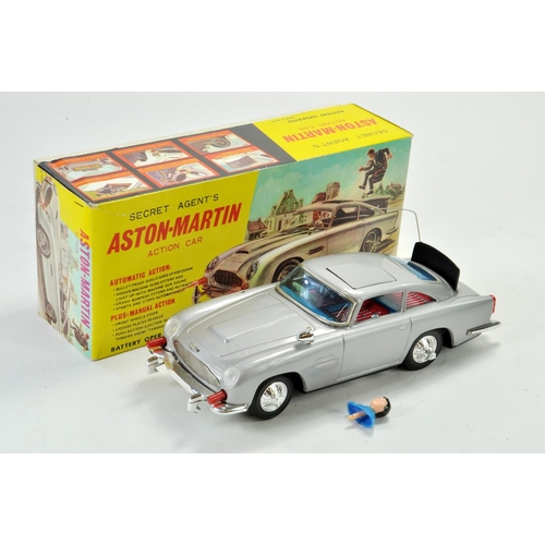 1184 - Gilbert Japanese large scale tinplate battery operated issue comprising James Bond 007 Aston Martin ... 