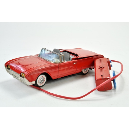 1187 - Yonezawa Japanese tinplate battery operated Ford Thunderbird with remote control. Working example ap... 