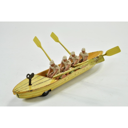 1190 - Scarce 1950's Clockwork Tinplate Rowing Team with Boat, depicting Oxford University (printed). Likel... 