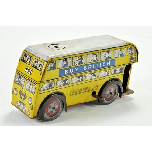 1193 - Wells (England) Clockwork Tinplate Trolley Bus in Yellow. Hard to find variation is incomplete, howe... 