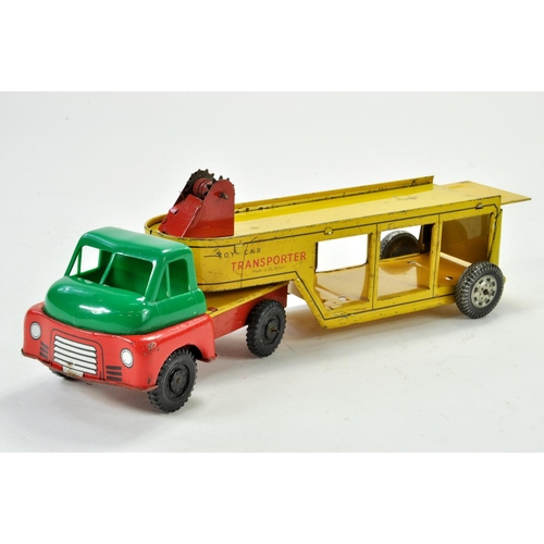 1195 - Wells (England) Tinplate Car Transporter. Some wear but still functional and generally good.