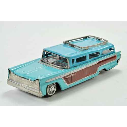 1198 - KKK Nihon Boeki Japanese Friction Driven Tinplate Lincoln Country Squire Station Wagon. Some light d... 