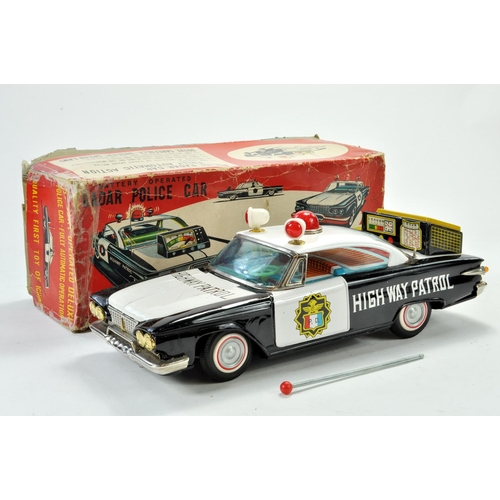 1208 - Ichiko (Japan) Battery Operated Tinplate Radar Police Car. Example is generally very good to excelle... 