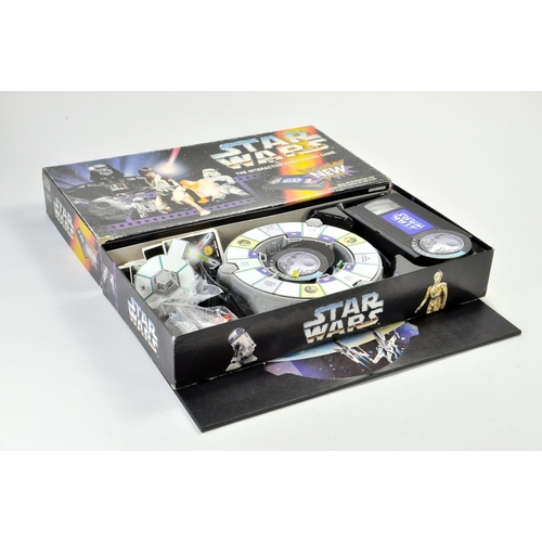 1242 - Star Wars Interactive Video Board Game. Whilst not confirmed, the game does appear to be predominant... 