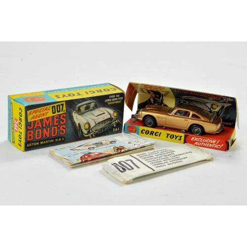 1319 - Corgi No. 261 James Bond Aston Martin DB5 from the film Goldfinger with gold body, red interior, Jam... 