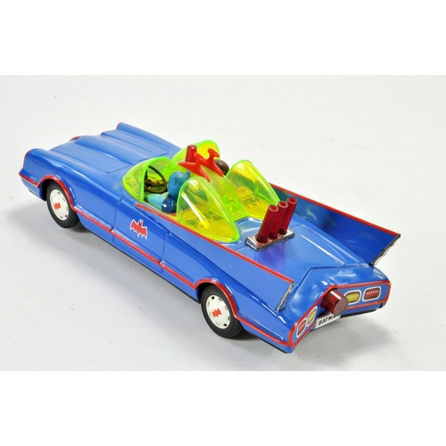 1183 - ASC Japanese large scale tinplate battery operated issue comprising the Batmobile with batman and ro... 