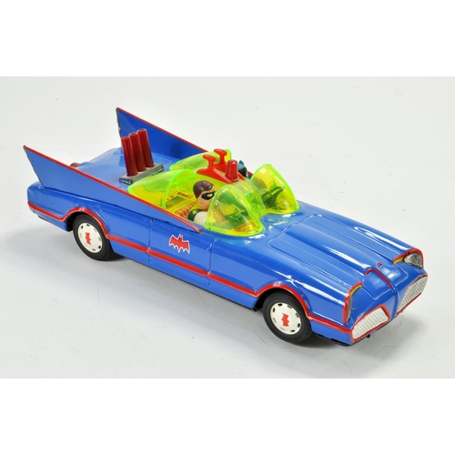 1183 - ASC Japanese large scale tinplate battery operated issue comprising the Batmobile with batman and ro... 