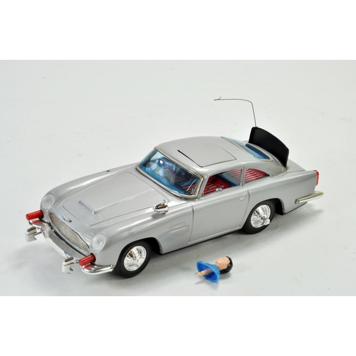 1184 - Gilbert Japanese large scale tinplate battery operated issue comprising James Bond 007 Aston Martin ... 