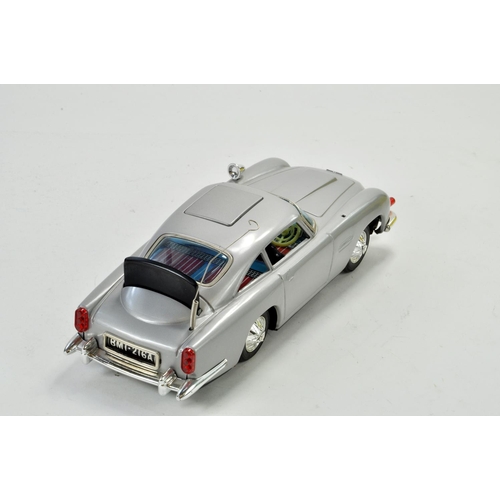 1184 - Gilbert Japanese large scale tinplate battery operated issue comprising James Bond 007 Aston Martin ... 