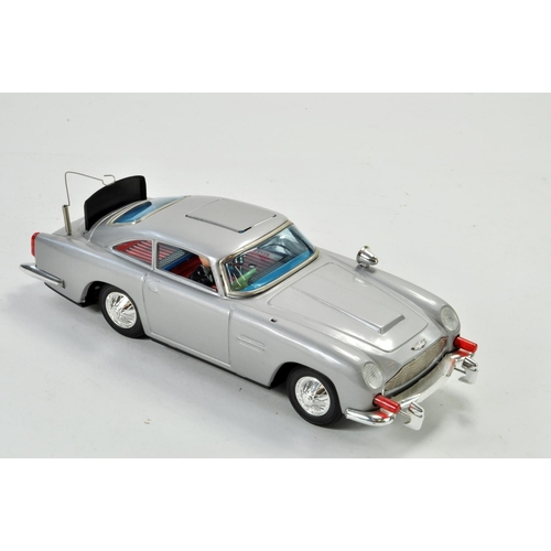 1184 - Gilbert Japanese large scale tinplate battery operated issue comprising James Bond 007 Aston Martin ... 