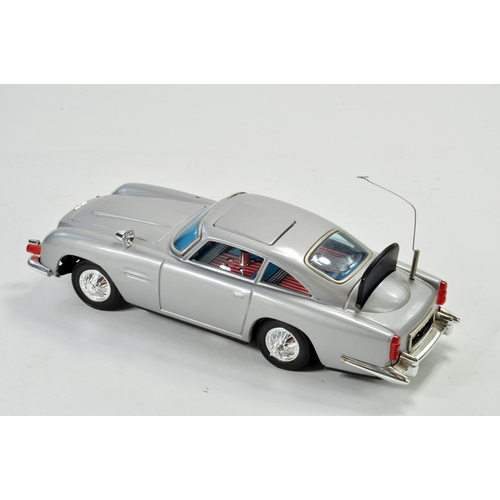 1184 - Gilbert Japanese large scale tinplate battery operated issue comprising James Bond 007 Aston Martin ... 