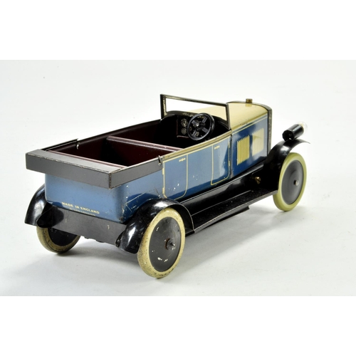 1215 - Burnett / Chad Valley (Ubilda Built) clockwork tinplate car with electric lights No. BL 12119. A cle... 