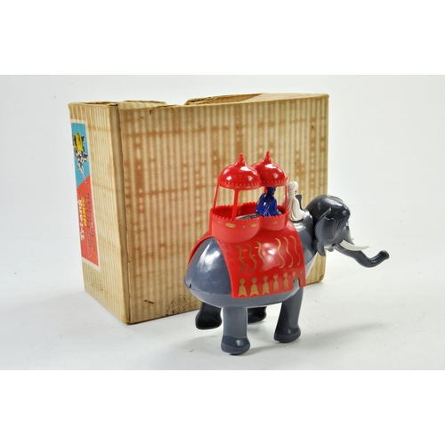 1290 - Triang Minic clockwork Elephant and Howdah plastic novelty toy consisting of elephant with 2 x figur... 