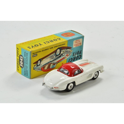 1323 - Corgi No. 304S Mercedes Benz 300SL Hard Top Roadster. In white, red, racing decals and spun hubs. Ap... 