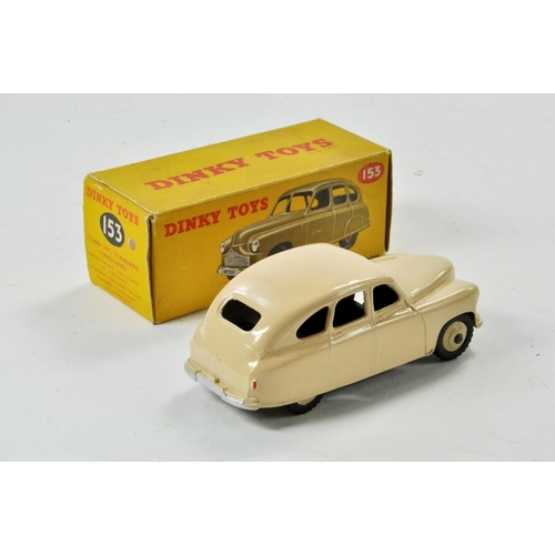 1330 - Dinky No. 153 Standard Vanguard Saloon in cream with cream hubs. Appears excellent with little or no... 