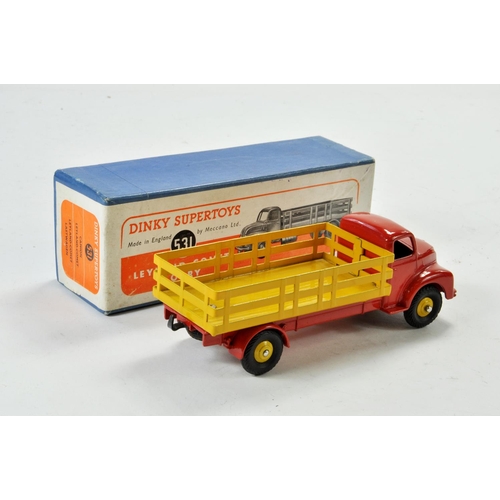 1331 - Dinky No. 531 Leyland Comet Stake Truck with red cab & chassis, yellow stake body & ridged hubs. App... 