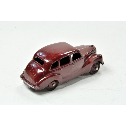 1432 - Dinky no. 40d Austin Devon in maroon, very good with minor marks throughout.