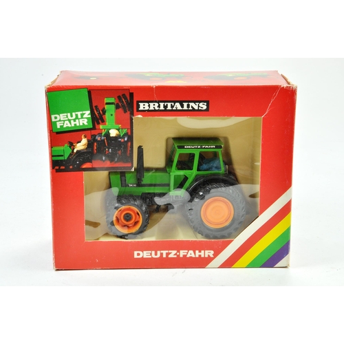 143 - Britains 1/32 Farm issue comprising Deutz DX92 Dual Wheel Tractor. Excellent, box has some minor sto... 