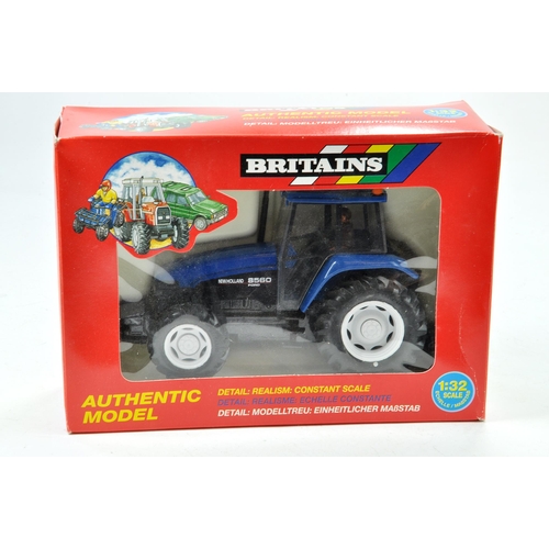 147 - Britains 1/32 Farm issue comprising New Holland 8560 Tractor. Excellent, box has some very minor sto... 