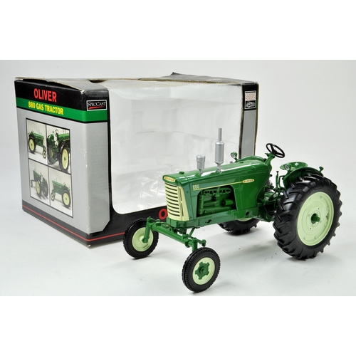 65 - Spec Cast 1/16 Oliver 880 Gas Tractor. Has been on display but appears excellent with original box.