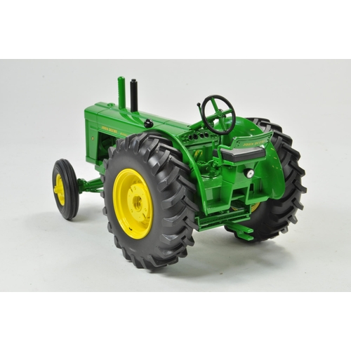 18 - Ertl Precision Key Series 1/16 John Deere Model R Tractor. Has been on display but still displays ex... 