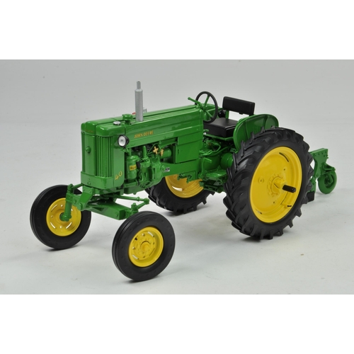 22 - Ertl Collector Edition 1/16 John Deere Model 40 Tractor with Plough. Has been on display, otherwise ... 