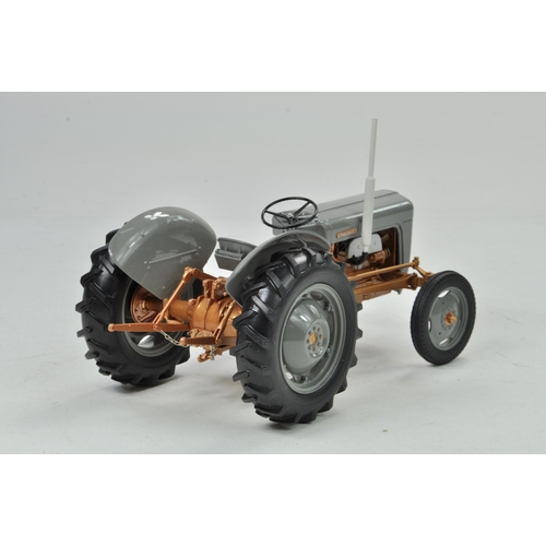 28 - Universal Hobbies 1/16 Ferguson FE35 Tractor. Has been on display but appears excellent with origina... 