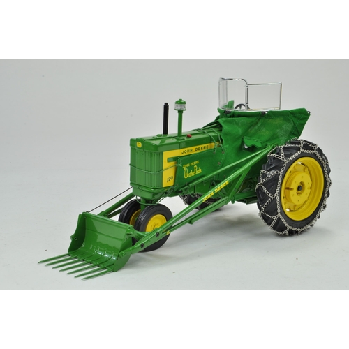 33 - Ertl Precision Series 1/16 John Deere 720 Tractor with 80 Blade and 45 Loader. Has been on display, ... 