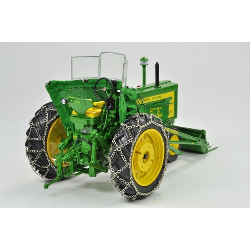 33 - Ertl Precision Series 1/16 John Deere 720 Tractor with 80 Blade and 45 Loader. Has been on display, ... 