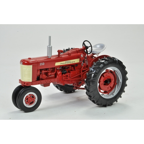 34 - Spec Cast 1/16 Farmall 350 Gas Tractor. Has been on display but appears excellent with original box.