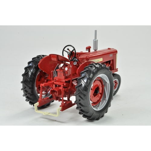 34 - Spec Cast 1/16 Farmall 350 Gas Tractor. Has been on display but appears excellent with original box.