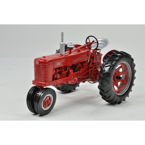 36 - Spec Cast 1/16 Farmall 300 Gas Tractor. Has been on display but appears excellent with original box.