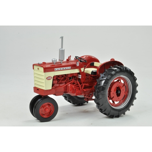 37 - Spec Cast 1/16 Farmall 340 Gas Tractor. Has been on display but appears excellent with original box.