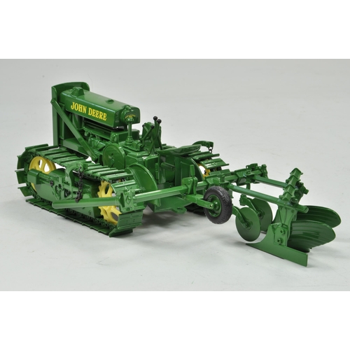 43 - Ertl 1/16 John Deere Lindeman Crawler Tractor with Two Bottom Plough. Has been on display but appear... 