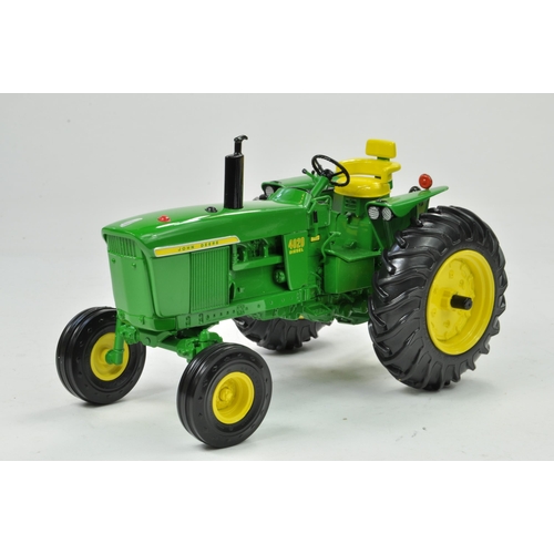 45 - Ertl Precision Series 1/16 John Deere 4020 Powershift Tractor. Has been on display, otherwise appear... 