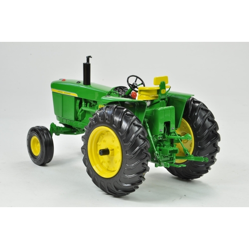 45 - Ertl Precision Series 1/16 John Deere 4020 Powershift Tractor. Has been on display, otherwise appear... 