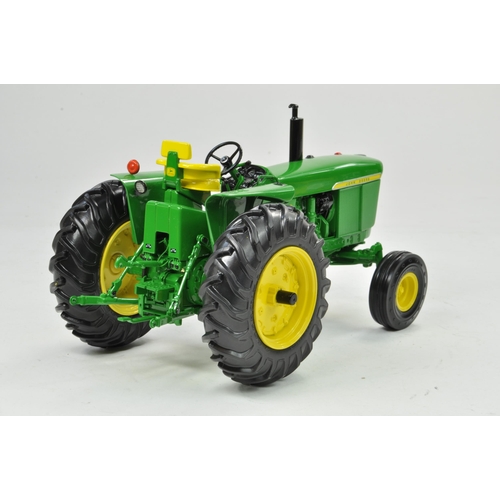 45 - Ertl Precision Series 1/16 John Deere 4020 Powershift Tractor. Has been on display, otherwise appear... 