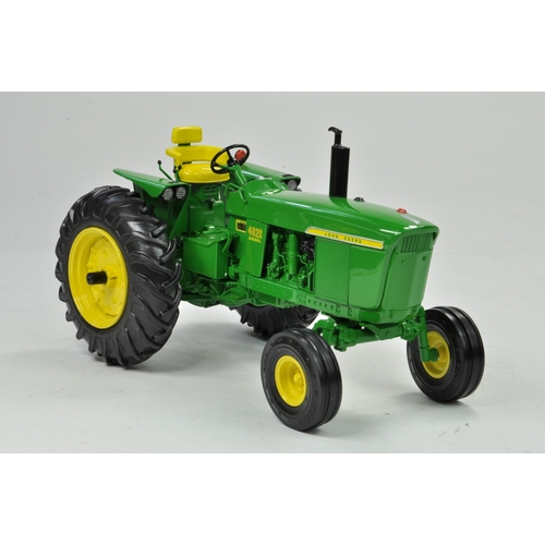 45 - Ertl Precision Series 1/16 John Deere 4020 Powershift Tractor. Has been on display, otherwise appear... 