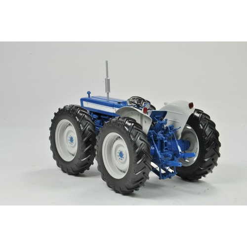 58 - Universal Hobbies 1/16 County 654 Tractor. Has been on display but appears excellent with original b... 